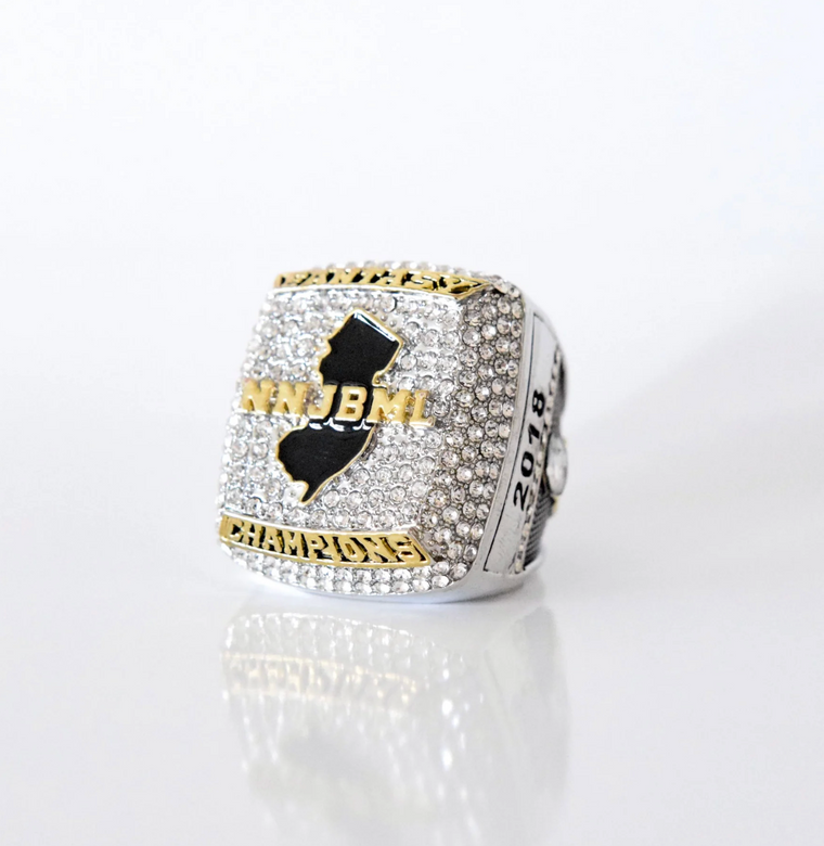 A pile of finished custom championship rings